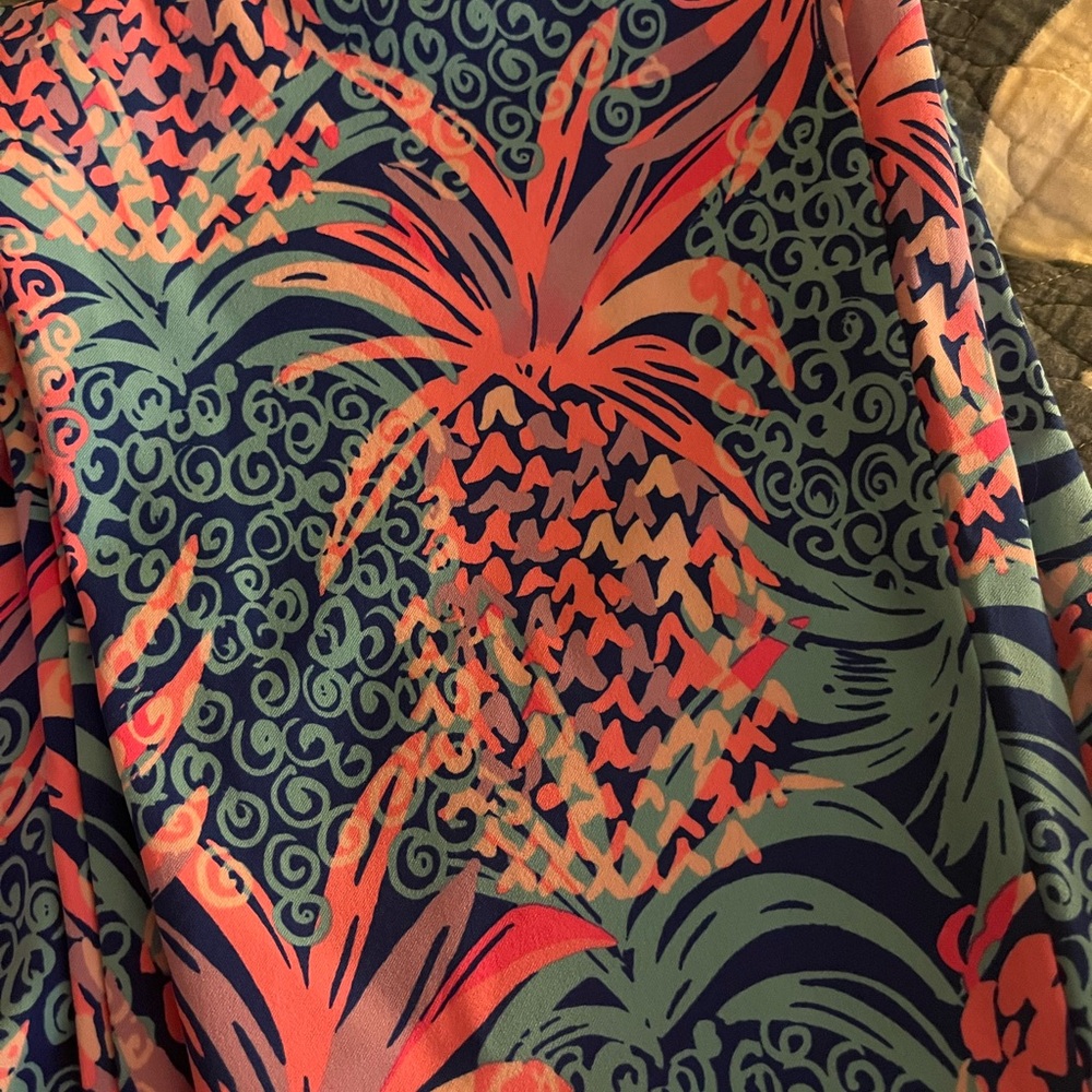 Vibrant Pineapple Print pants with pockets.